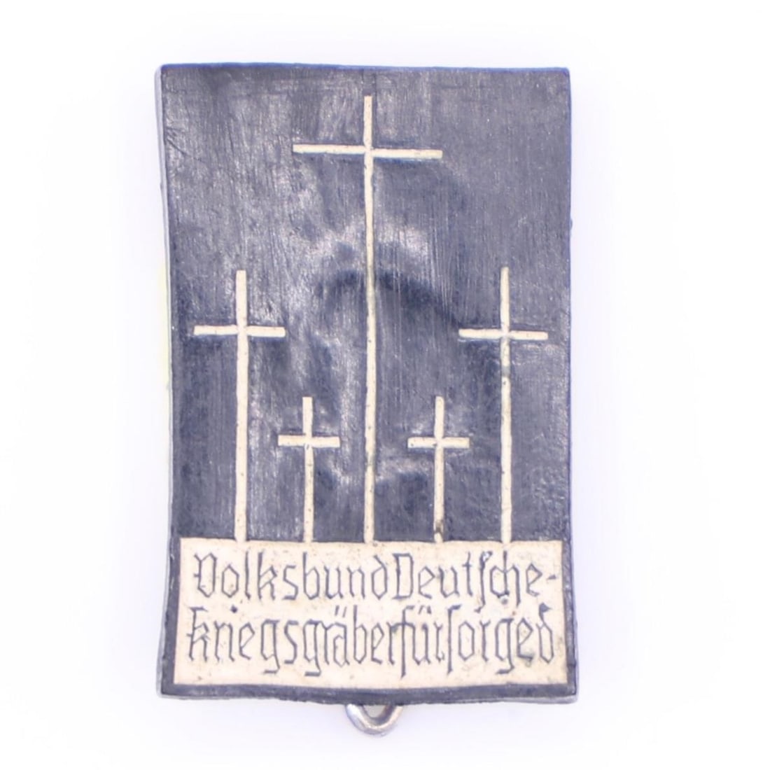 Volksbund War Graves Support Pin: A small rectangular badge showing five simple crosses rising from a dark background, symbolizing military graves. Along the bottom is the inscription "Volksbund Deutsche Kriegsgräberfürsorge". It's 