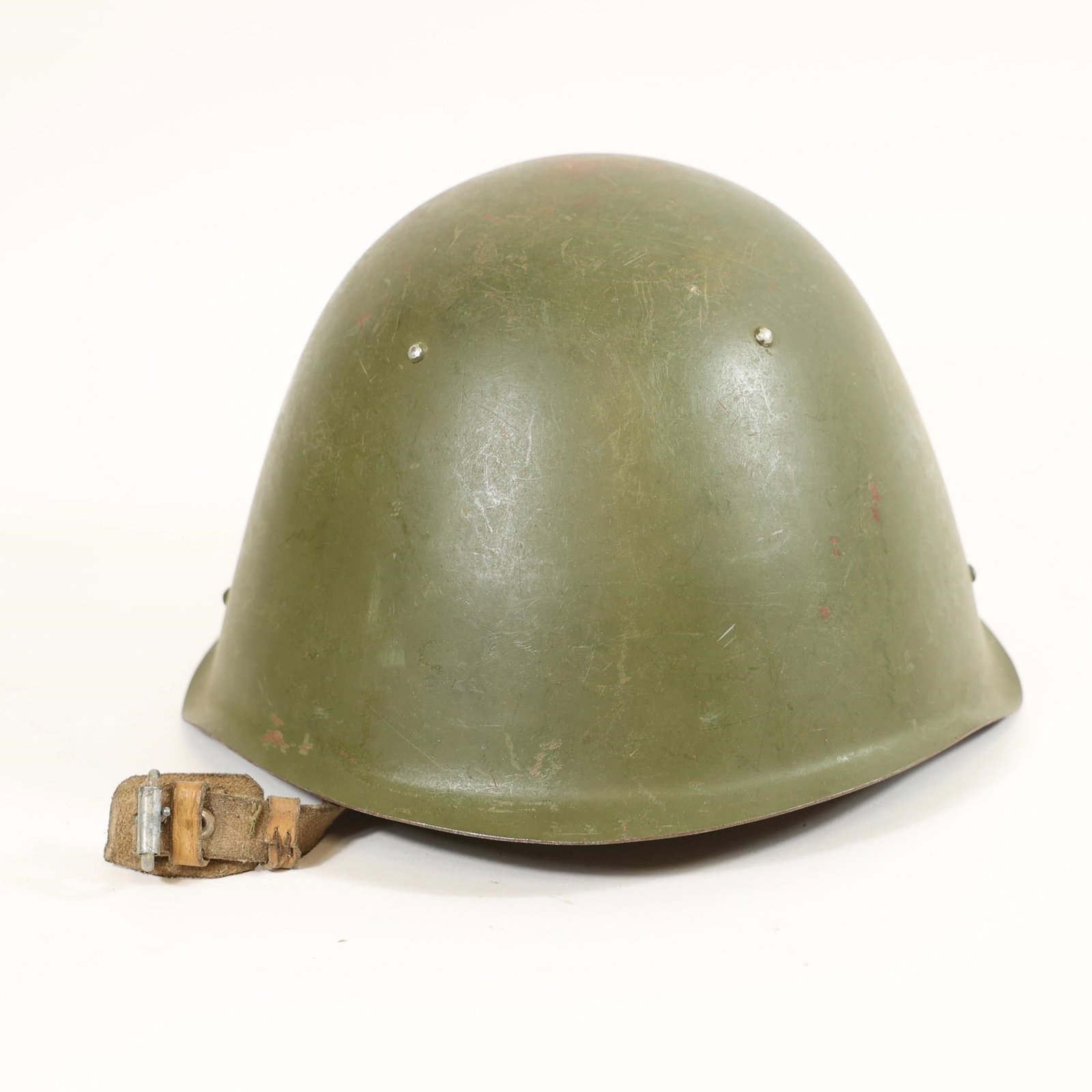 Soviet SSh-68 Steel Military Helmet - Olive Green: Soviet SSh-68 (1968 model) steel military helmet featuring the classic olive green finish and distinctive rounded dome design. This iconic Cold War-era helmet was widely issued to Soviet armed forces