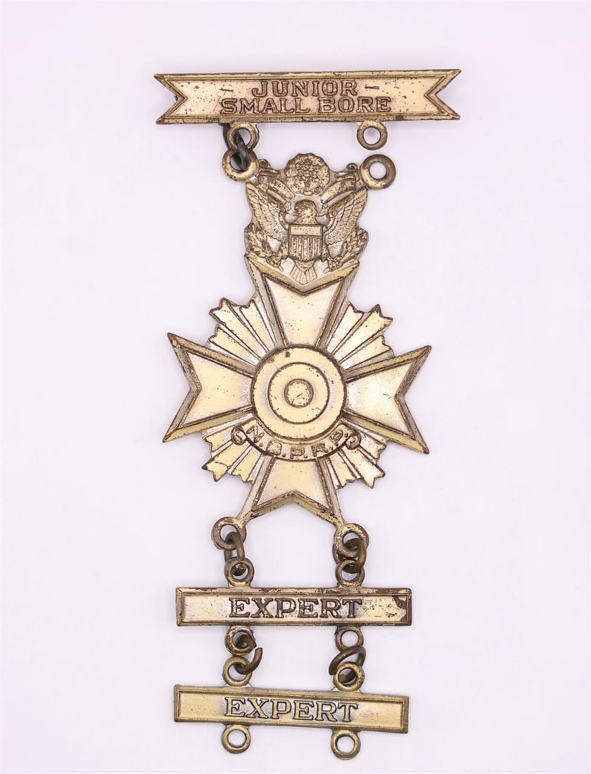 Junior Small Bore Expert Medal: Vintage National Board for the Promotion of Rifle Practice (NBPRP) Junior Small Bore Expert marksmanship medal.