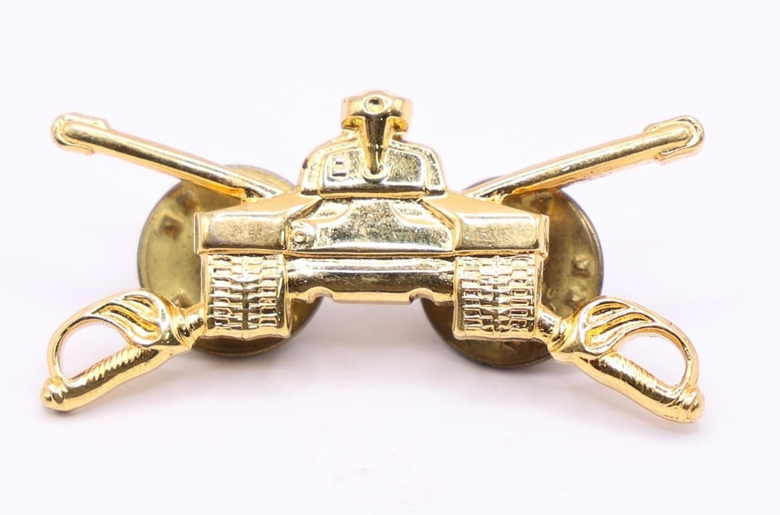 US Army Armor Branch Officer pin: U.S. Army Armor Branch Officer Insignia. This insignia is worn by officers in the Armor Branch, which includes the Army's tank and cavalry forces. Description: The insignia features a detailed tank