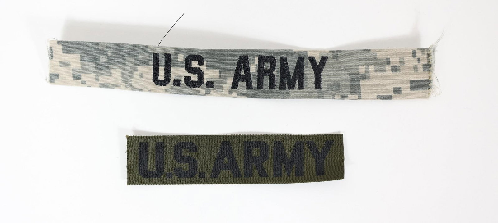 U.S. Army Name Tapes: U.S. Army name tapes, which are fabric strips worn on military uniforms for identification purposes. Dimensions: 4.5in x1in, 8in x1in