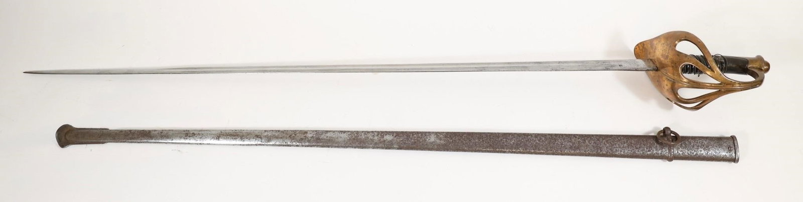 French Model 1896 Cavalry Trooper Sword: French Model 1896 cavalry trooper's sword featuring a straight, single-fullered blade stamped "G. Brasse Fabt. Paris," with brass hilt and leather grip. Includes steel scabbard. Approximate
