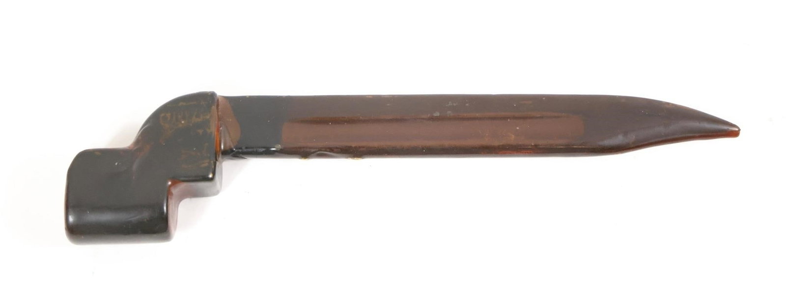Vintage British Lee Enfield Bayonet: Vintage British Lee Enfield No9 bayonet encased in a solid molded-resin scabbard with a dark brown/black finish. The piece is fully sealed with no removable parts, giving it a unique display quality. 