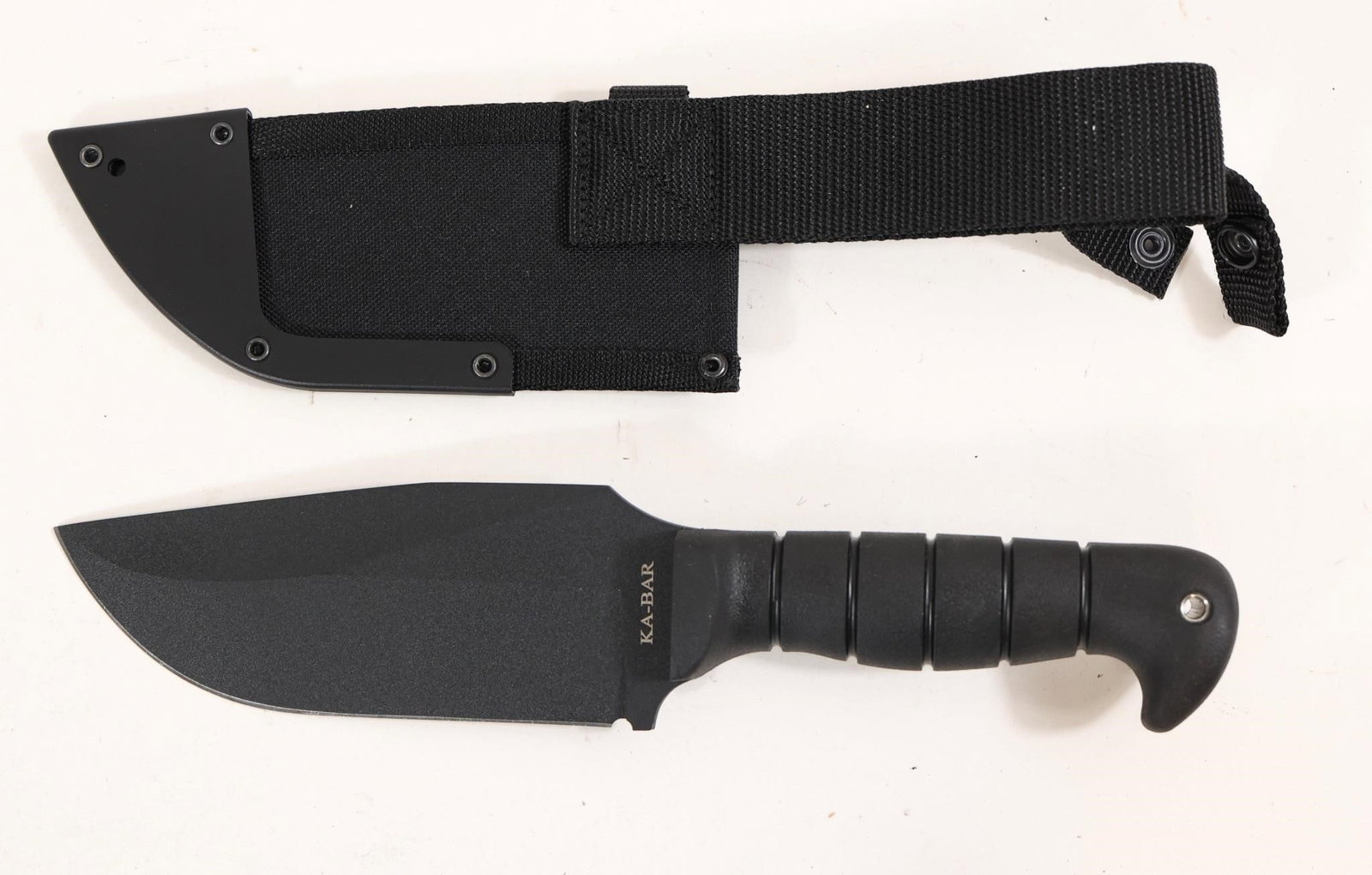 Ka-bar 1278 Heavy Duty Warthog 12.25" Fixed Knife: This Ka-bar 1278 Heavy Duty Warthog 12.25" Fixed Knife Is Built For The Toughest Tasks, Pairing A Robust 1085 Carbon Steel Blade With A Hollow Grind And 20 Degree Edge Angles For Reliable Cutting