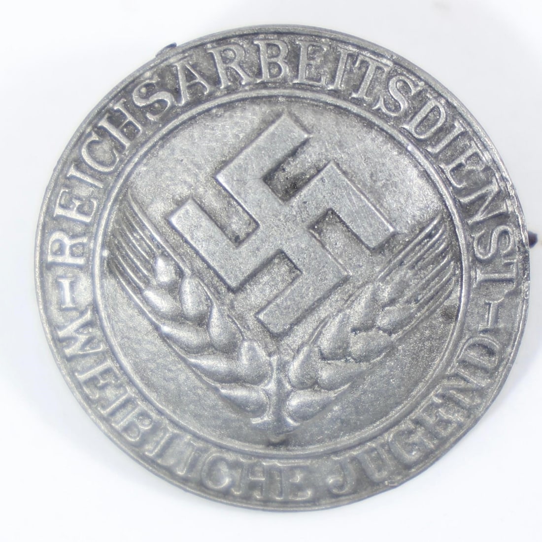 Vintage German Wound Badge Military Decoration: The item pictured is a vintage German military decoration, specifically a Wound Badge, which was awarded for wounds sustained in hostile action.
