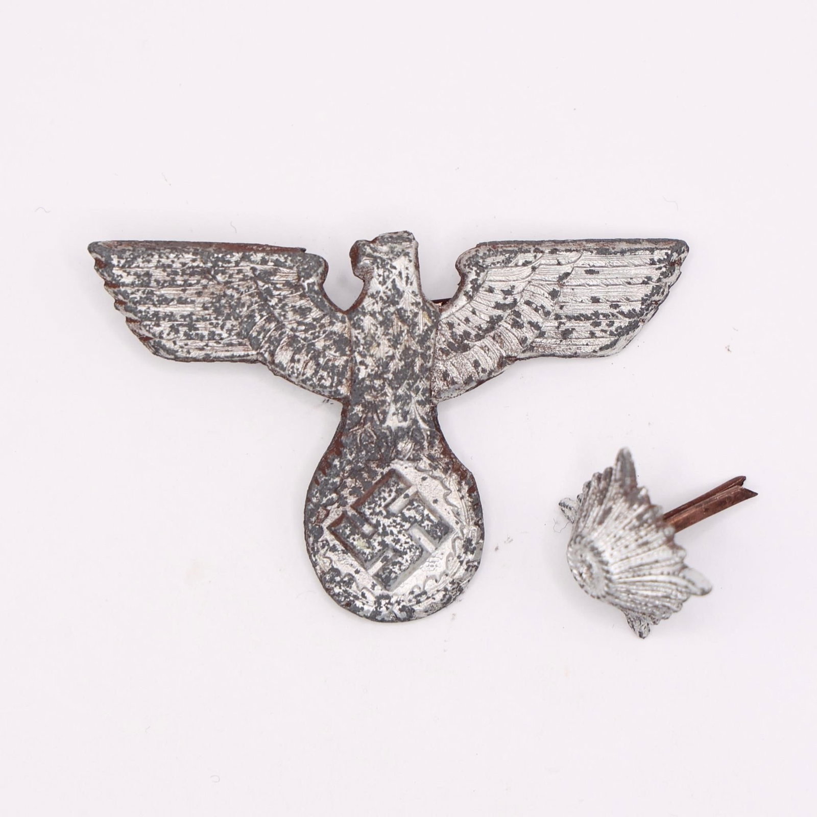 German NSKOV Badge & Wehrmacht Rank Star: German Third Reich NSKOV (National Socialist War Victim's Care) badge and original WWII Wehrmacht soldier metal rank star pip, both metal, pin-backed, typical period designs, good condition; sold toge