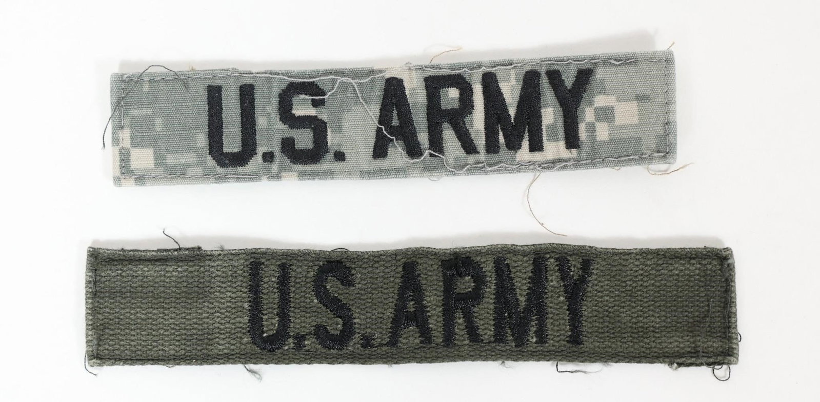 U.S. Army Name Tapes: U.S. Army name tapes, which are fabric strips worn on military uniforms for identification purposes. Dimensions; 5in x 1in, 5.5in x 1in