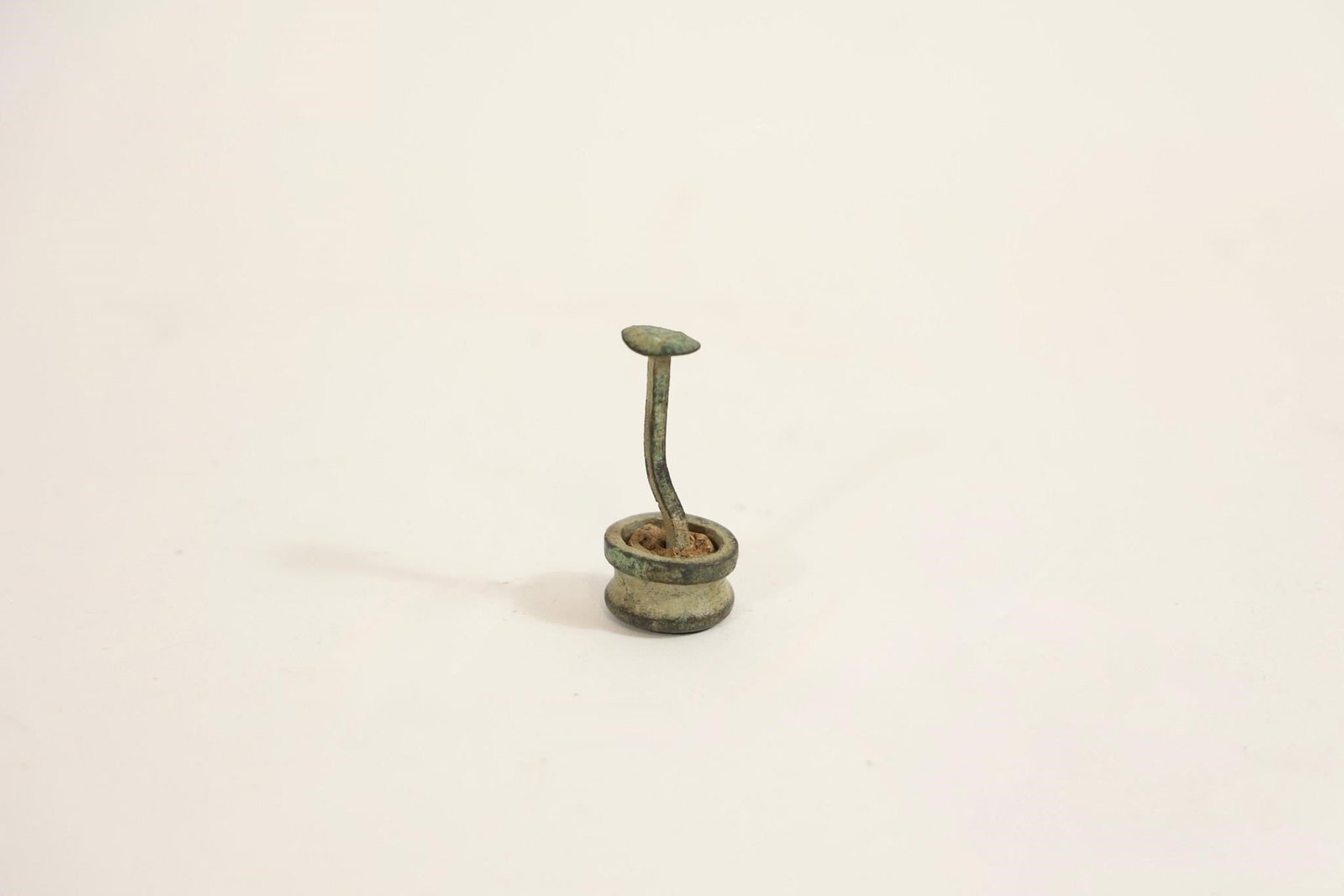 Civil War Brass Tampion Marked "C-47": Civil War brass tampion with engraved unit/company marking "C-47" on top. Used to fit in gun muzzles when troops were on the march. Part of cork remains inside. Features dug green patina. Recovered