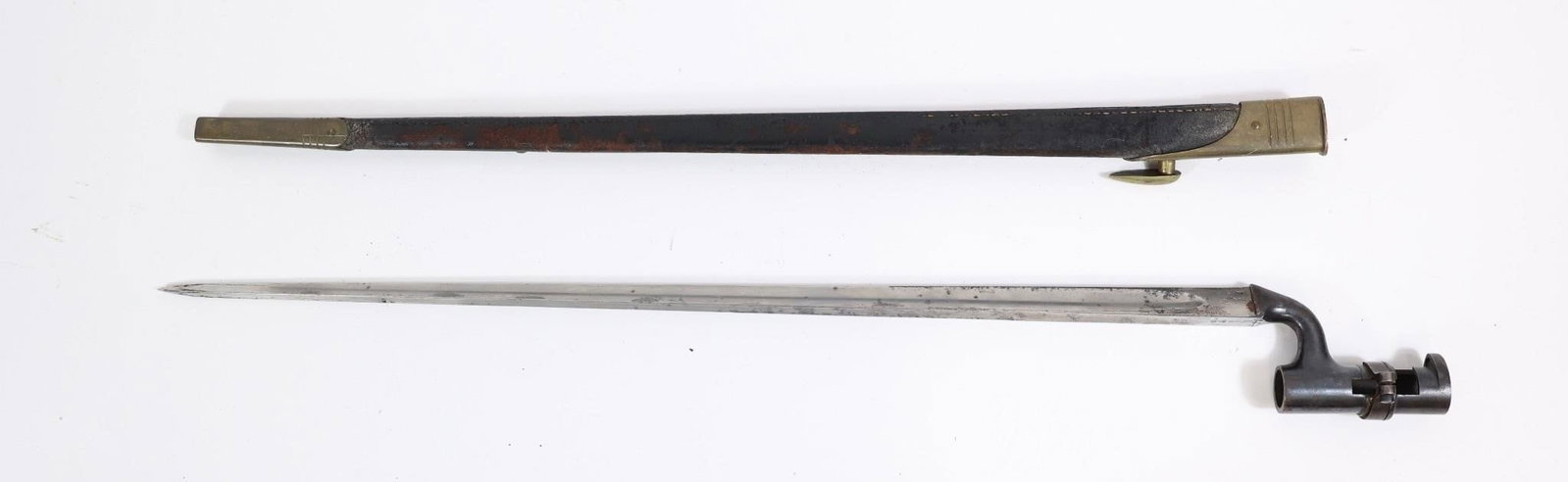 British Marked Triangular Socket Bayonet: British Marked Triangular Socket Bayonet w/ ScabbardOverall length: approximately 25 inches; blade length: approximately 22 inches.