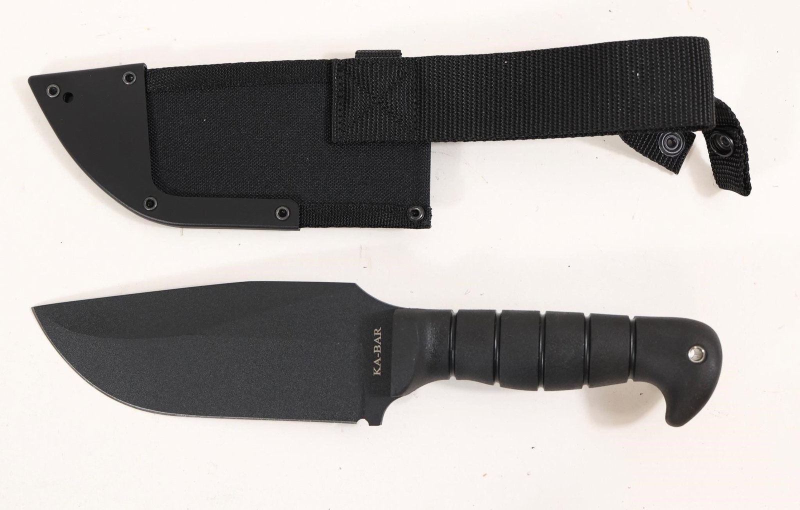 Ka-bar 1278 Heavy Duty Warthog 12.25" Fixed Knife: This Ka-bar 1278 Heavy Duty Warthog 12.25" Fixed Knife Is Built For The Toughest Tasks, Pairing A Robust 1085 Carbon Steel Blade With A Hollow Grind And 20 Degree Edge Angles For Reliable Cutting