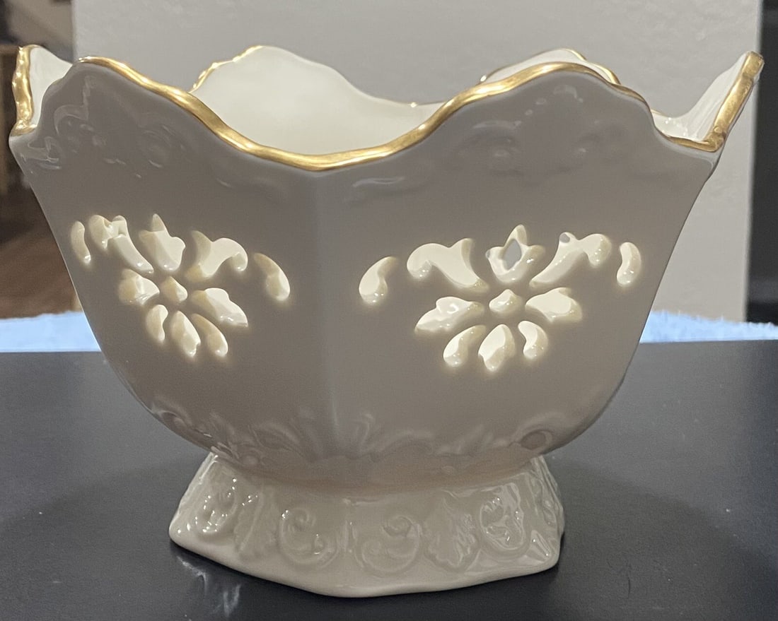Vintage (1990s) Lenox Langtry Bowl - Limited Edition Collectible: Collectible Lenox Bowl w/Gold Trim - Limited EditionVintage 1996 - Paul Sebastian Langtry CollectionFeatures:Ivory colorCut out patternMeasurements (approximate):Height: 4 1/2”Width: 7”