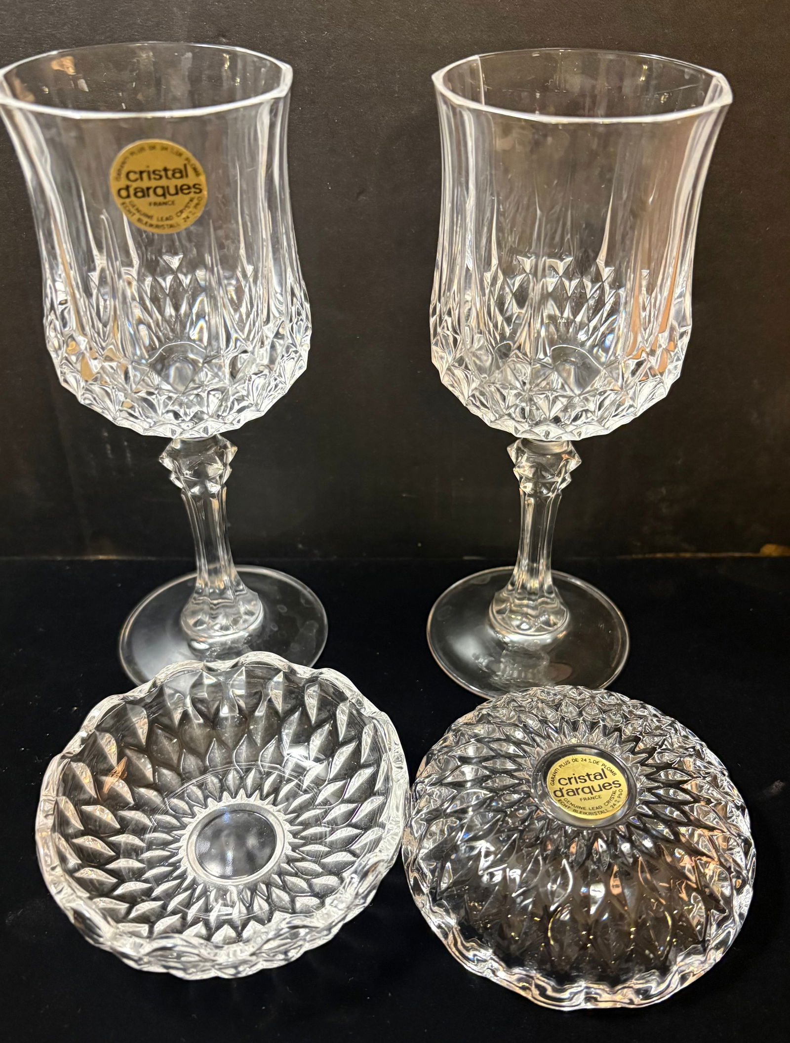 Vintage (1970s) French Cristal D'arques Genuine Lead Crystal Water Goblets & Candy Dishes: This lot features two pair of Cristal D'Arques 24% lead crystal French pieces. 1). Pair of 8 oz Water Goblets made of genuine lead crystal and are in good used condition. Measurements (approximate):