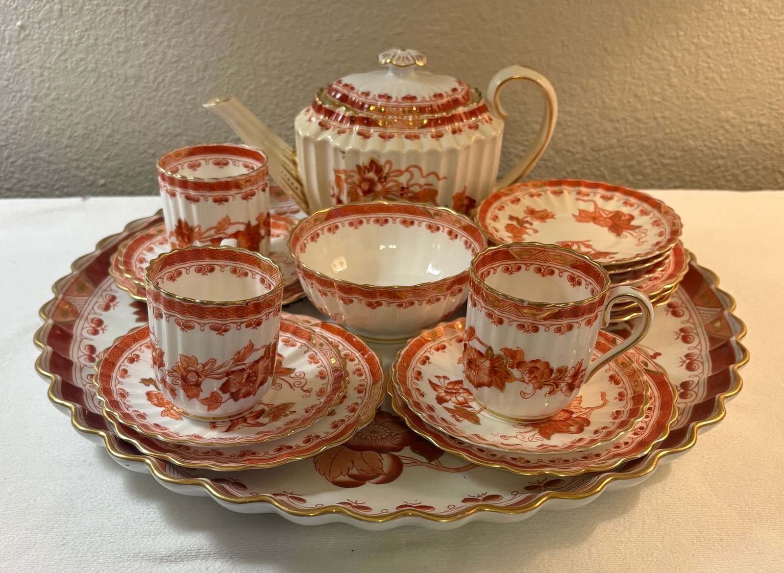 Antique (Ca. 1850s) 19-Piece Copeland Spode Tea Set - "Orange Willow" Pattern: This lot features a 19-piece Copeland Spode tea set in the "Orange Willow" (Orange Rust) pattern w/extensive gold detailing.Included in this set:- Teapot w/lid,- Serving tray (15"Dia.),- Sugar Bowl,-