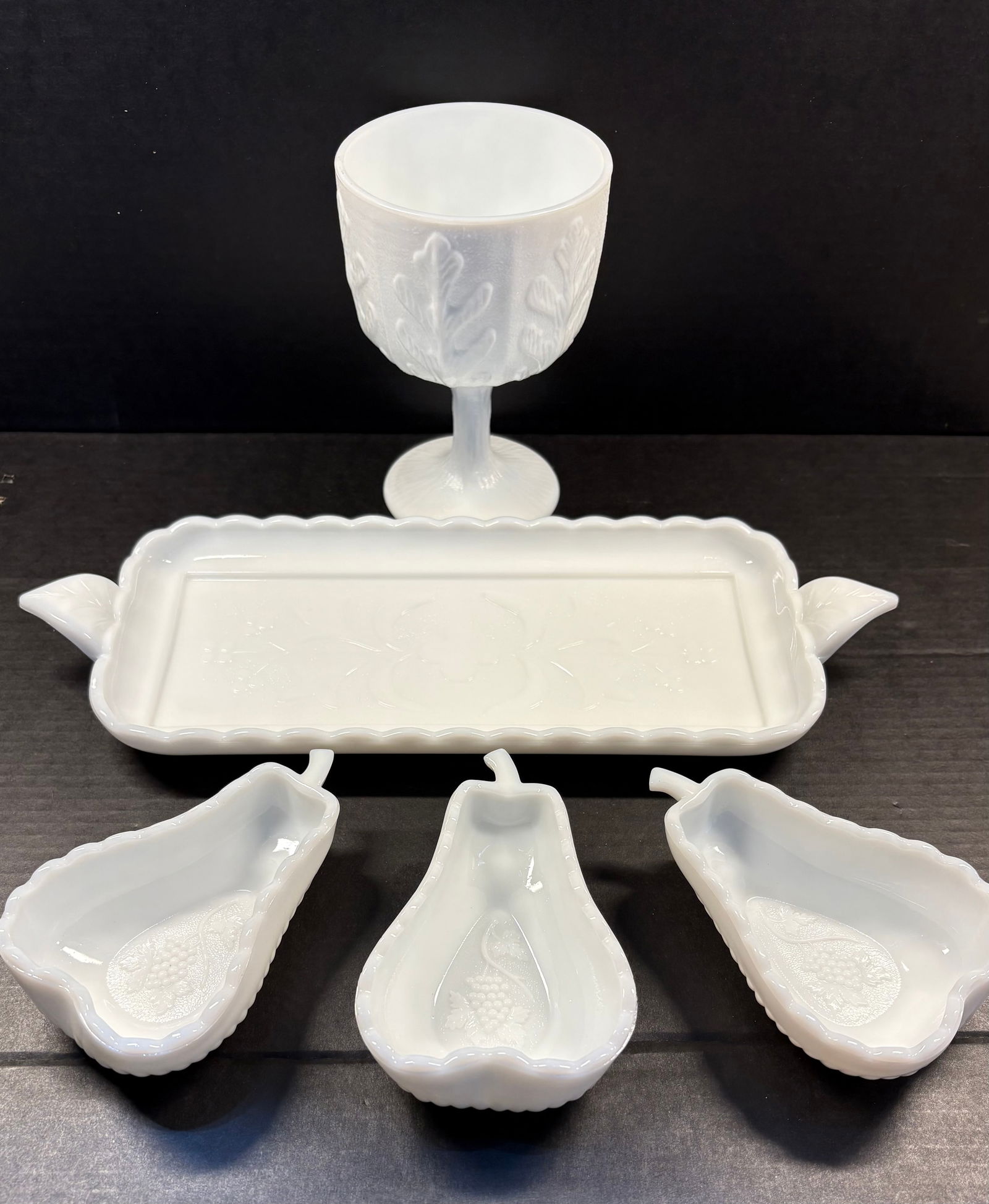 Vtg (1950s/70s) 4-Piece Imperial Milk Glass Dishes + Milk Glass Goblet: This lot features a 5-piece Imperial milk glass & Harvest Grape dishware set. All pieces have emobossed fruit & floral patterns. Perfect pieces for a sampling tray or olive selection servers. Great fo