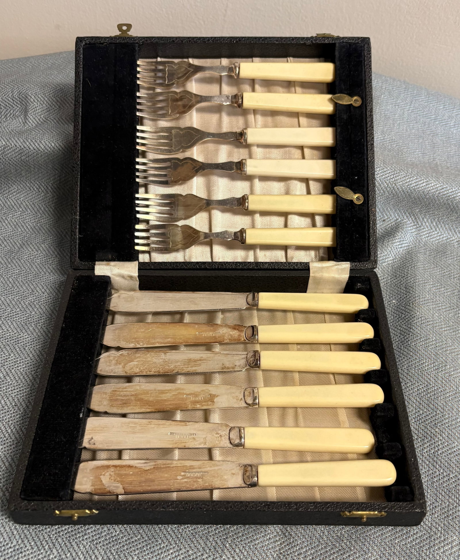 Vintage (MCM) Fish Cutlery Set (Mid-20th Century): Vintage fish cutlery set, likely dating from the early to mid-20th century (roughly the 1910s to the 1940s). These sets were a staple of formal dining and typically consist of six pairs of specialized