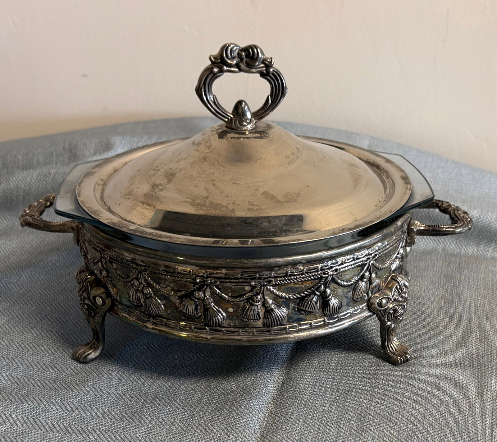 Vintage Silver-Plated & Pyrex Serving Casserole Dish: Vintage silver-plated covered serving dish (chafing dish or a casserole dish). It's a three-part set designed for elegant food presentation and service. It features a...1). Decorative Stand that is a 
