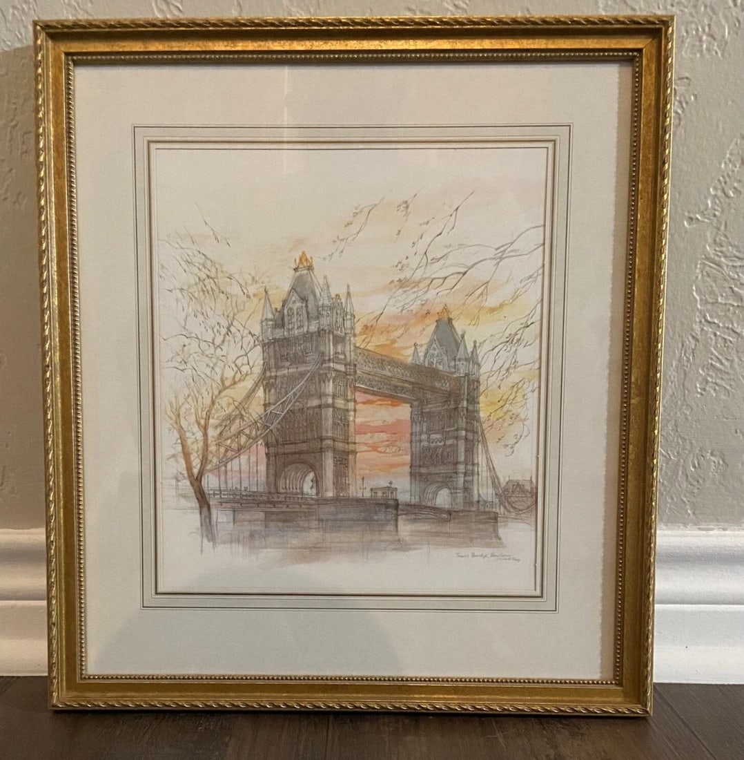 London’s “Tower Bridge” Framed Print: Here we have a print (with a signature) of London England’s, Tower Bridge. It is nicely framed and contains a signature on the lower right. The Tower Bridge opened with great ceremony in 1894 after 