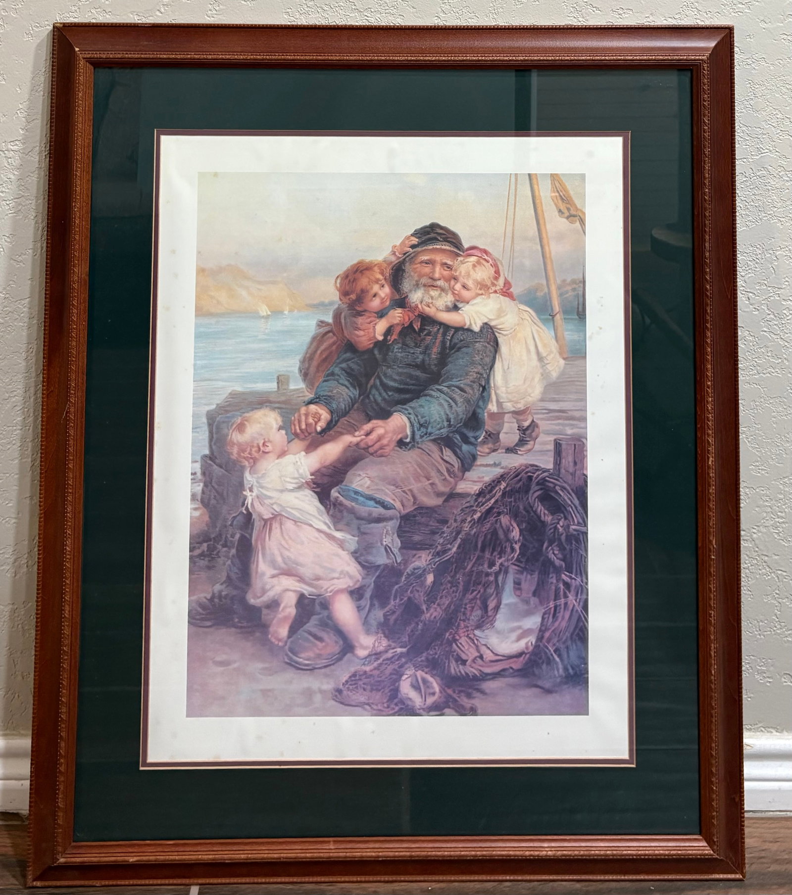 Vtg MCM "Welcome Home" Artwork Framed Print: This artwork is titled "Which Do You Love Best?" (alternatively known as "Welcome Home") by the Victorian English painter Frederick Morgan. The piece portrays an elderly fisherman or sailor sitting by
