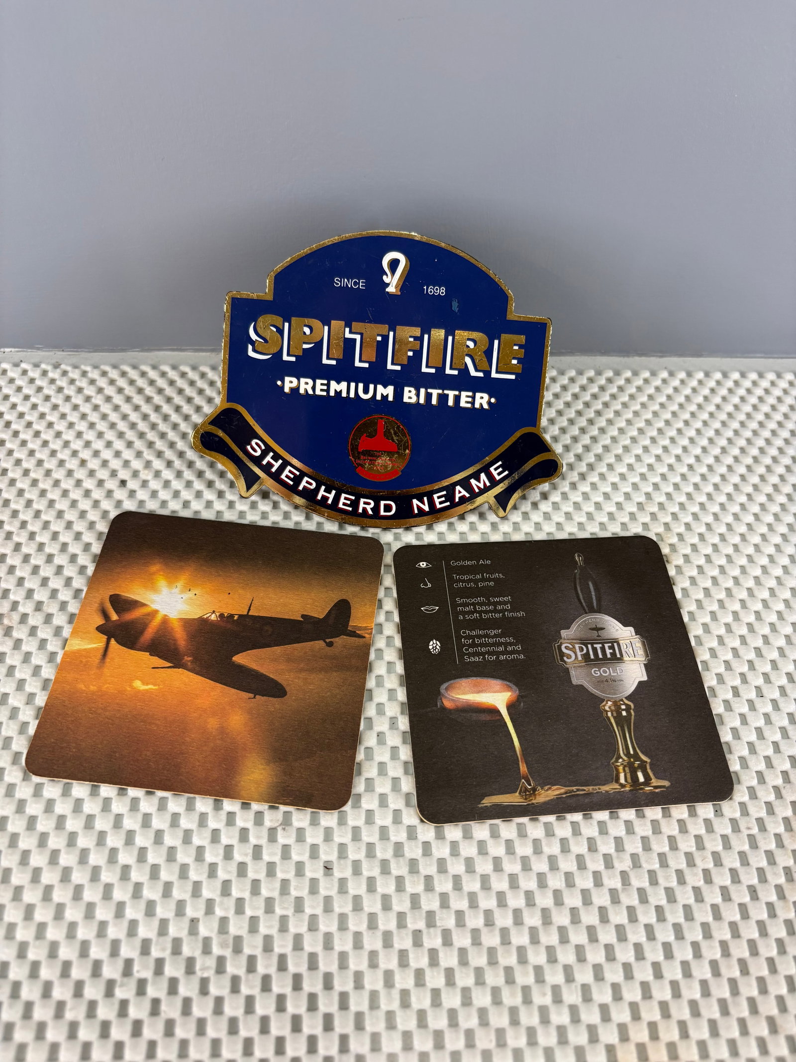 Vintage (1990s) British Beer Pump Tap Handle - Spitfire Premium: This is an authentic vintage molded plastic British beer pump tap handle/badge + two matching beer coasters for the Spitfire Premium Bitter. These clasps are badges attached to beer taps in British pu
