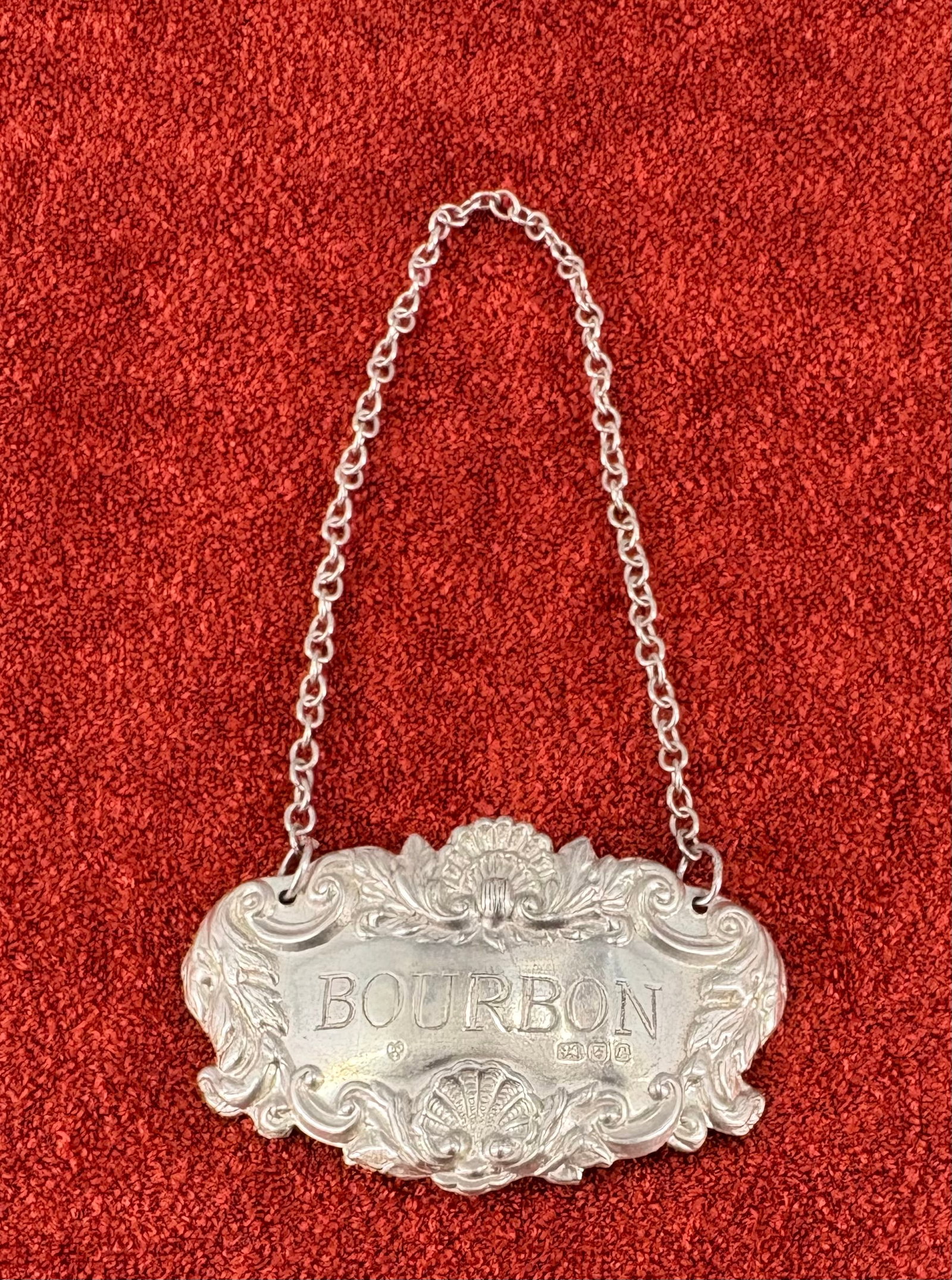 Vtg (1985) Sterling Silver (British) Decanter Label - Bourbon: Vintage sterling silver Bourbon decanter label (also called a wine ticket or bottle tag) used to identify the contents of a liquor decanter. "BOURBON" is engraved across a textured background featurin