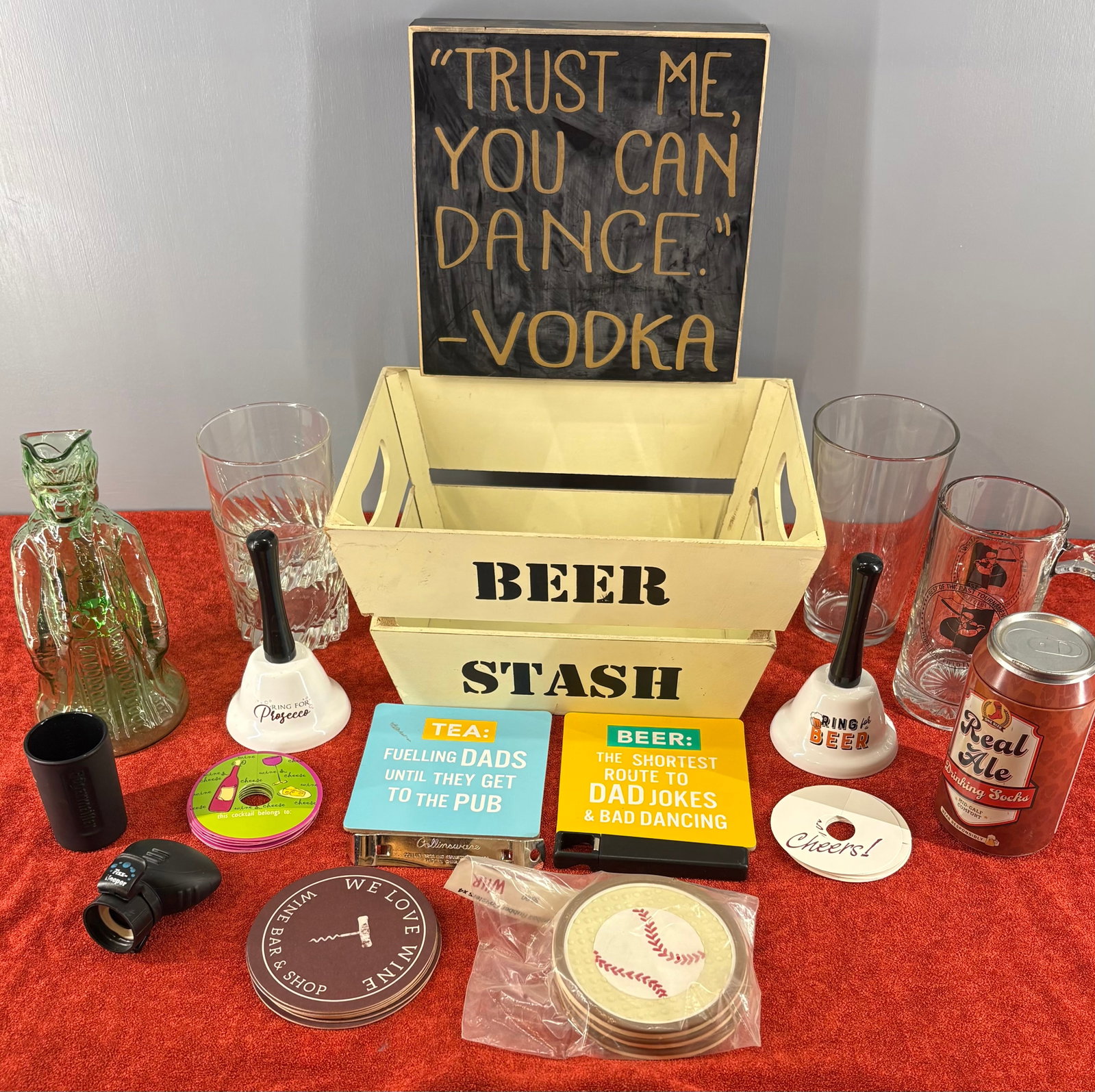 Vtg Barware & Drinking Themed Accessories Collection: A curated collection of drinking-themed/barware accessories. Items included in this lot....1). Wooden "BEER STASH" Crate, 2). "Ring for Beer" & "Ring for Prosecco" call bells, 3). Dad Beer Themed humo