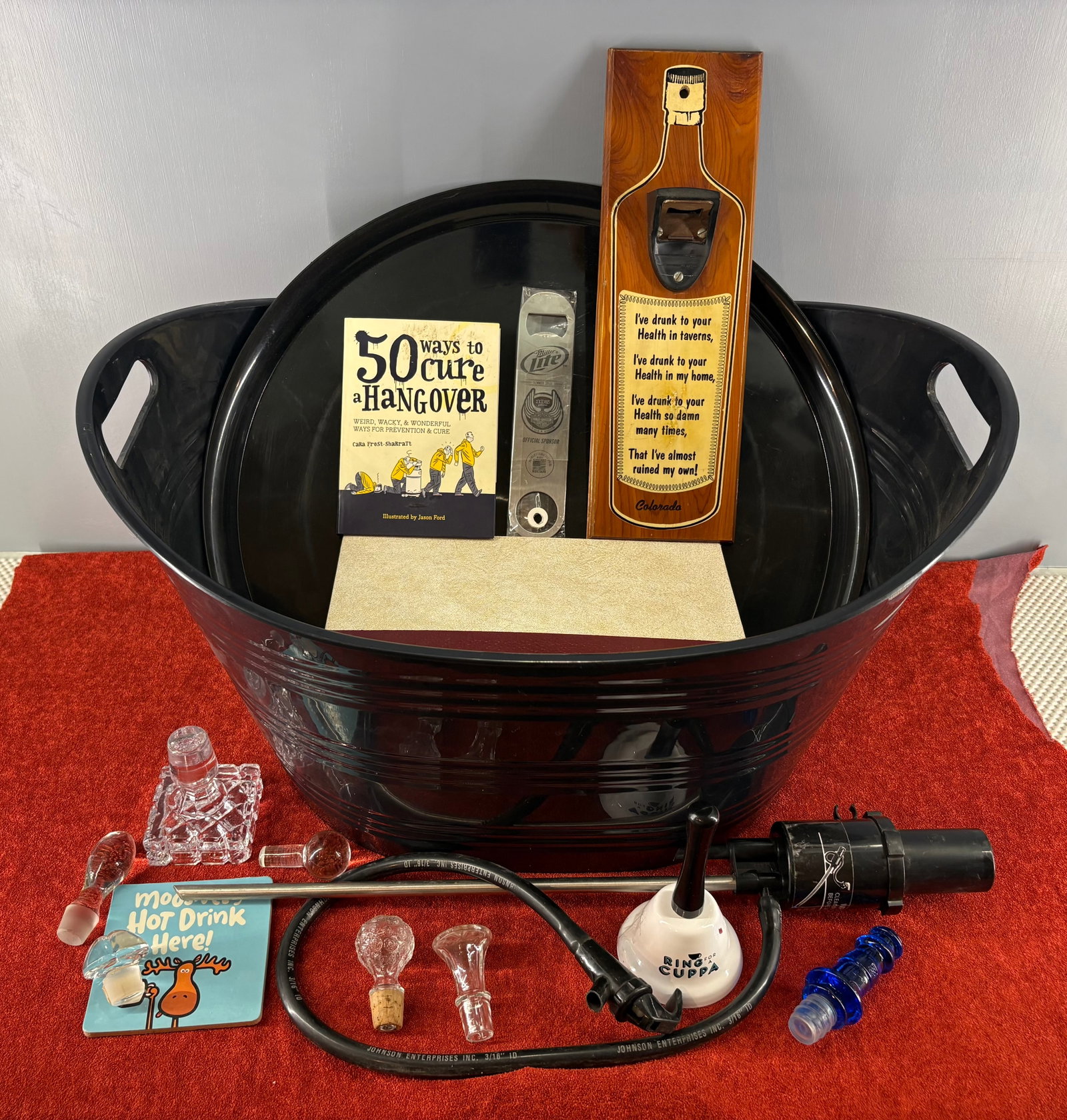 Vintage Home Barware & Accessories Collection: A collection of home barware, novelty drinking accessories, and home decor items curated around a large black party ice/beer tub. The inventory includes....1). Black Plastic Beer/Ice Tub - Large 21" x