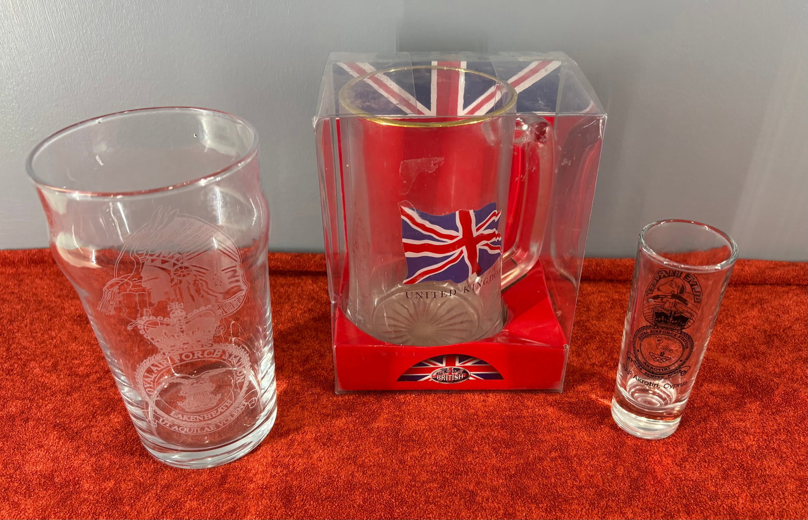 Vintage Trio of (British) Military & Geographic Barware Collection: A collectible set of British military and geographic souvenir glassware. The collection includes three distinct pieces...1). RAF Lakenheath Pint Glass - A clear pub pint glass etched with the official
