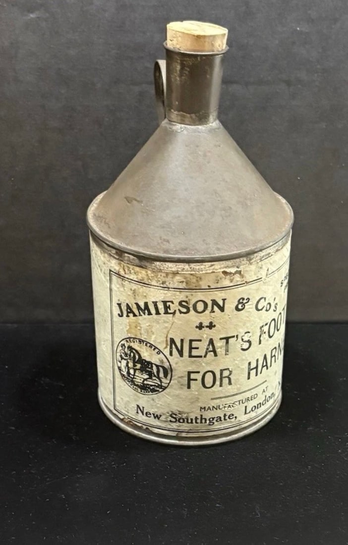 Share Antique (l1800S-e1900S) British Jamieson & Co. Neat's Foot Oil Metal Can: This is an authentic antique British Jamieson & Co. Neat's Foot Oil metal can w/paper label and cork stopper. Manufactured at New Southgate, London, it was a "Specially Prepared" oil for horse harness