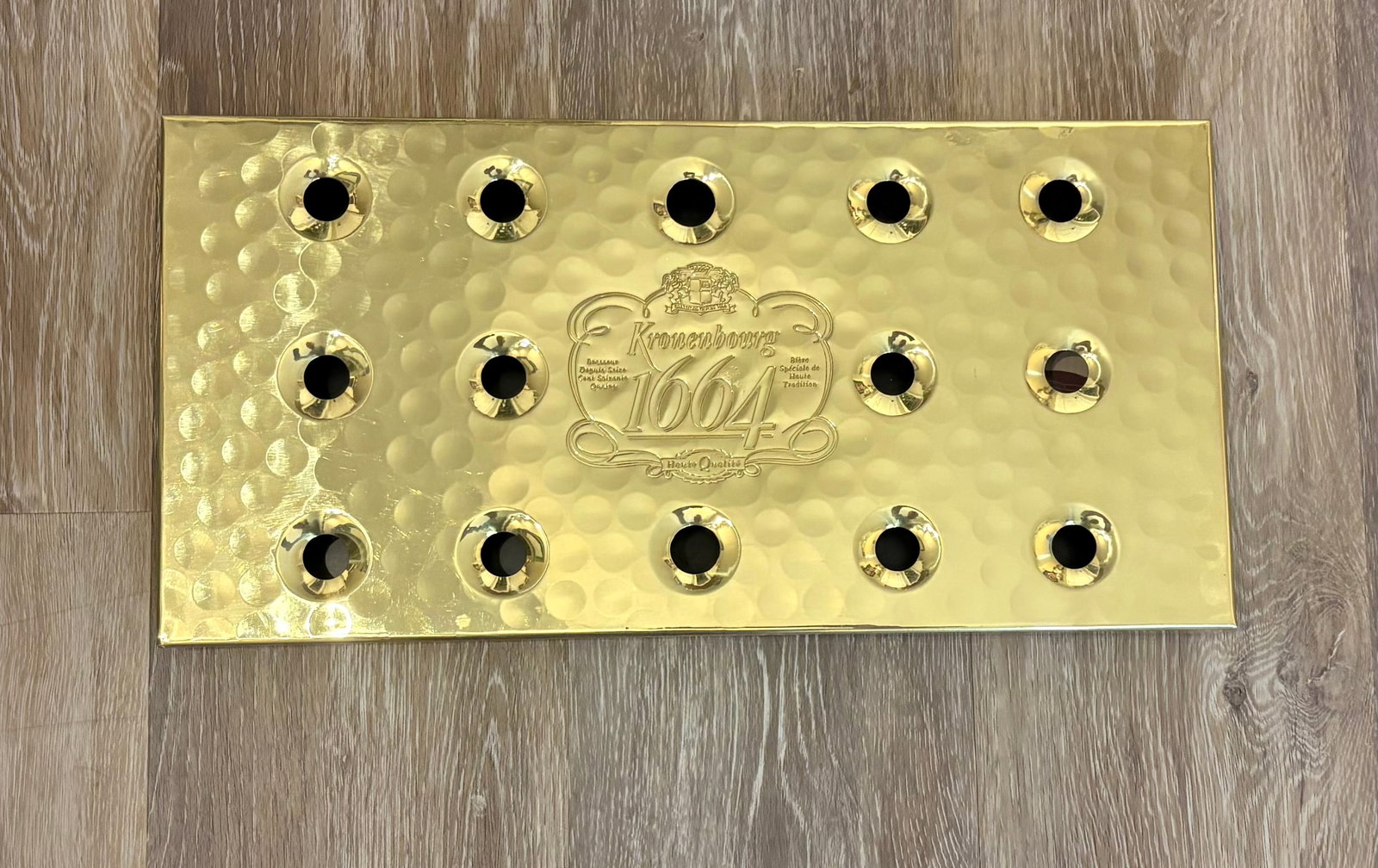 Vintage (1990s) French (Kronenbourg) Brass-Effect Beer Bar Drip Tray: Vintage brass-effect beer bar drip tray branded by the French brewery Kronenbourg 1664. It's placed on a bar counter directly beneath a beer tap font to catch accidental spills, foam, and overflow whi