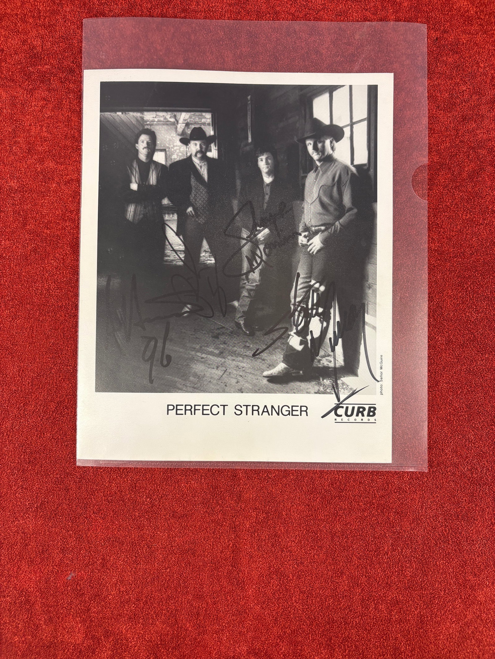 Vtg (1996) Hand-Signed "Perfect Stranger" Curb Records Promotional Print: Hand-signed 8x10 promotional print of the 1990s American country music band Perfect Stranger during their era with Curb Records. The four primary band members pictured in this classic lineup are: Stev