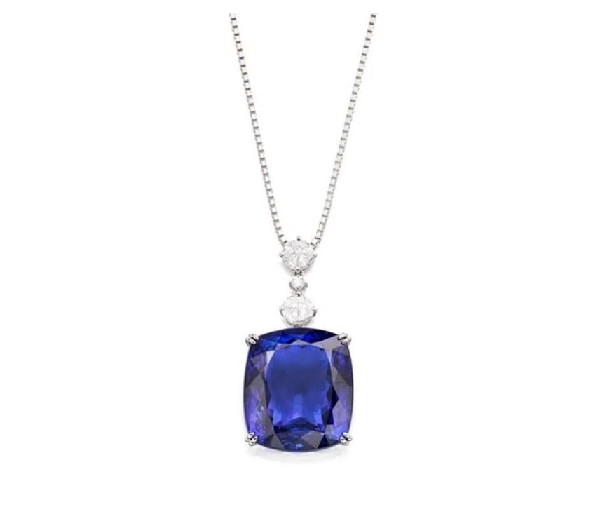 43ct Natural Tanzanite Pendant in 18K Gold: Estimate $62,000-$95,00018Kt gold inlaid with 43ct natural tanzanite and South African natural diamond, bright color, clean-crystal, good clarity. Gorgeous design, elegant temperament, fashion and sim