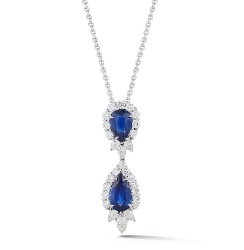18k White Gold 6.81ct Sapphire & Diamond Pendant: 18k White Gold 6.81ct Sapphire & Diamond PendantEstimate $28,500-$42,000An elongated drop pendant in vibrant sapphires and diamonds. This Pendant is set in 18 karat white gold features 6.81 carat of S