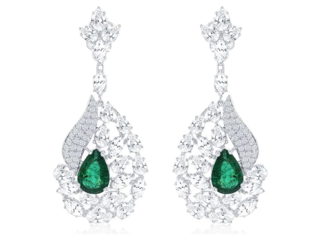 18k Gold 2.63ct Emerald & 6.39ct Diamond Earrings: 18k Gold 2.63ct Emerald & 6.39ct Diamond EarringsEstimate $22,000-$31,000A significant look for such a light and airy diamond setting and two perfectly matched emeralds. Item: # 03037 Setting: 18K W C