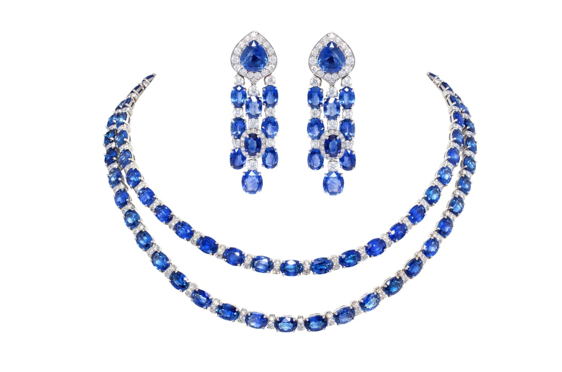 Blue Sapphire Diamond Necklace and Chandelier Earrings Set Design by Ella Gafter: Blue Sapphire Diamond Necklace and Chandelier Earrings Set Design by Ella GafterThe blue sapphire and diamond necklace and earrings set features a total of 174.55 carats of oval cut and drop shape fac