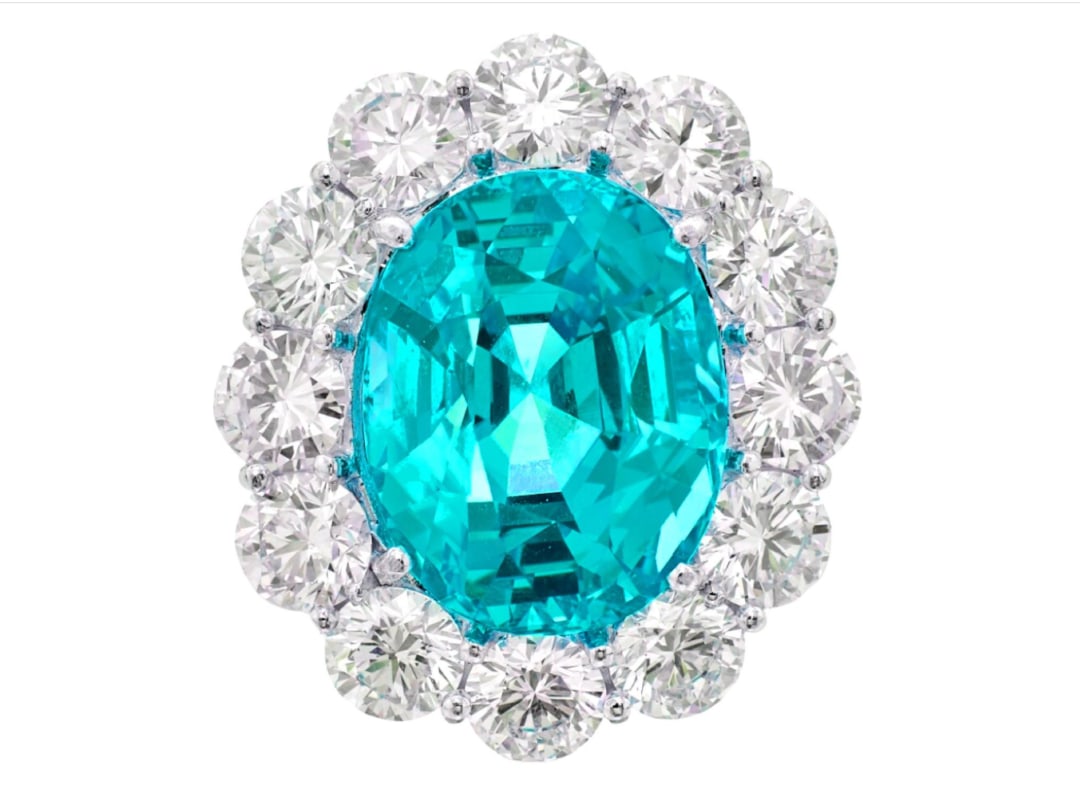 Exceptional 7 Carat Neon Paraiba Tourmaline Ring Certified by C. Dunaigre: Exceptional 7 Carat Neon Paraiba Tourmaline Ring Certified by C. DunaigreExceptional 7 Carat Neon Paraiba Tourmaline RingCertified by C. DunaigreAn extraordinary jewel showcasing a vivid 7.00 carat Ne