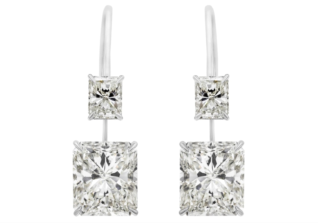 GIA Certified 12.16 Carats Total Radiant Cut Diamond Drop Earrings in Platinum: GIA Certified 12.16 Carats Total Radiant Cut Diamond Drop Earrings in PlatinumA stunning pair of drop earrings, showcasing two GIA certified radiant cut diamonds weighing 6.04 and 6.12 carats with K c