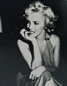 Marilyn Monroe biting her fingernail