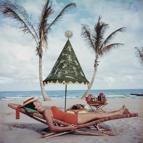 SLIM AARONS 'PALM BEACH' PRINT: Slim Aarons 'Palm Beach' glossy Print measuring at 28x28 inches