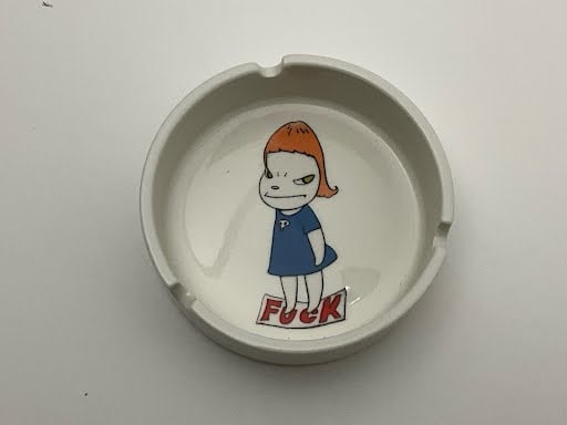 YOSHITOMO NARA 'F UCK' CERAMIC ASHTRAY: Yoshitomo Nara 'Fuck ceramic ashtray. Measures 4" x 4" x 1/4".