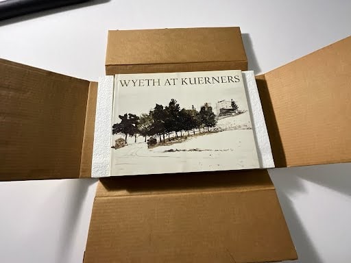 Wyeth at Kuerners signed by Andrew and Betsy Wyeth 1976: Measures 13 1/4 x 10 1/4 inches, comes in original shipping box, signed by both Andrew and Betsy Wyeth in pen
