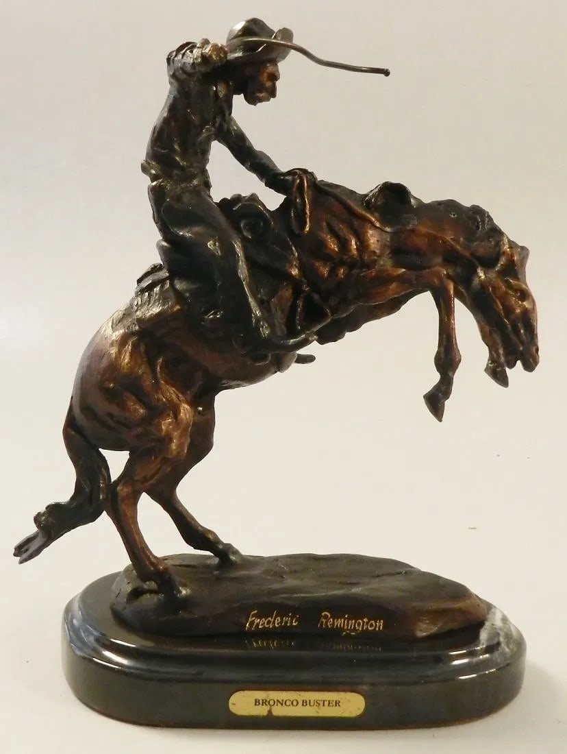 After Frederic Remington Bronze Sculpture: After Remington Bronco Buster Measures: 10 inches tall Signed on bottom