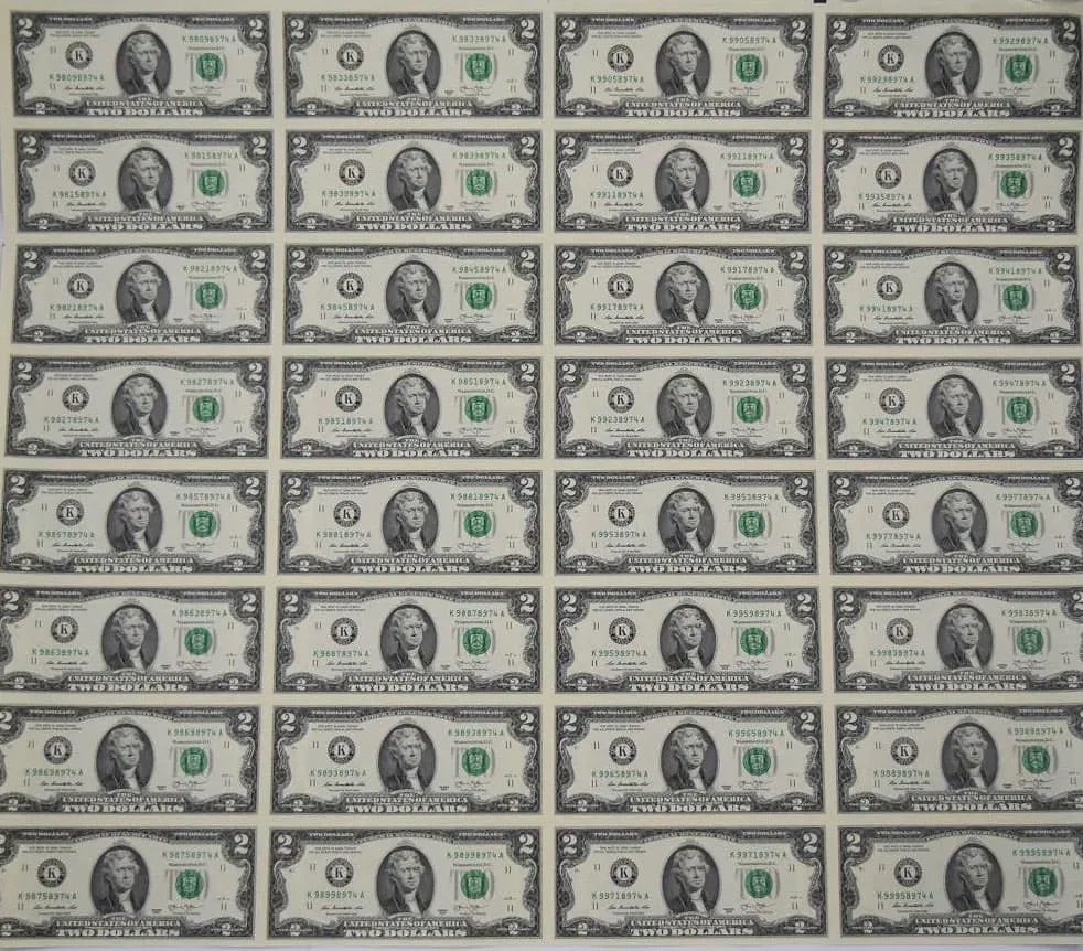 Uncut Two Dollar Bill Paper Currency Sheet: Large sheet of uncut two dollar bill paper currency (32 bills)