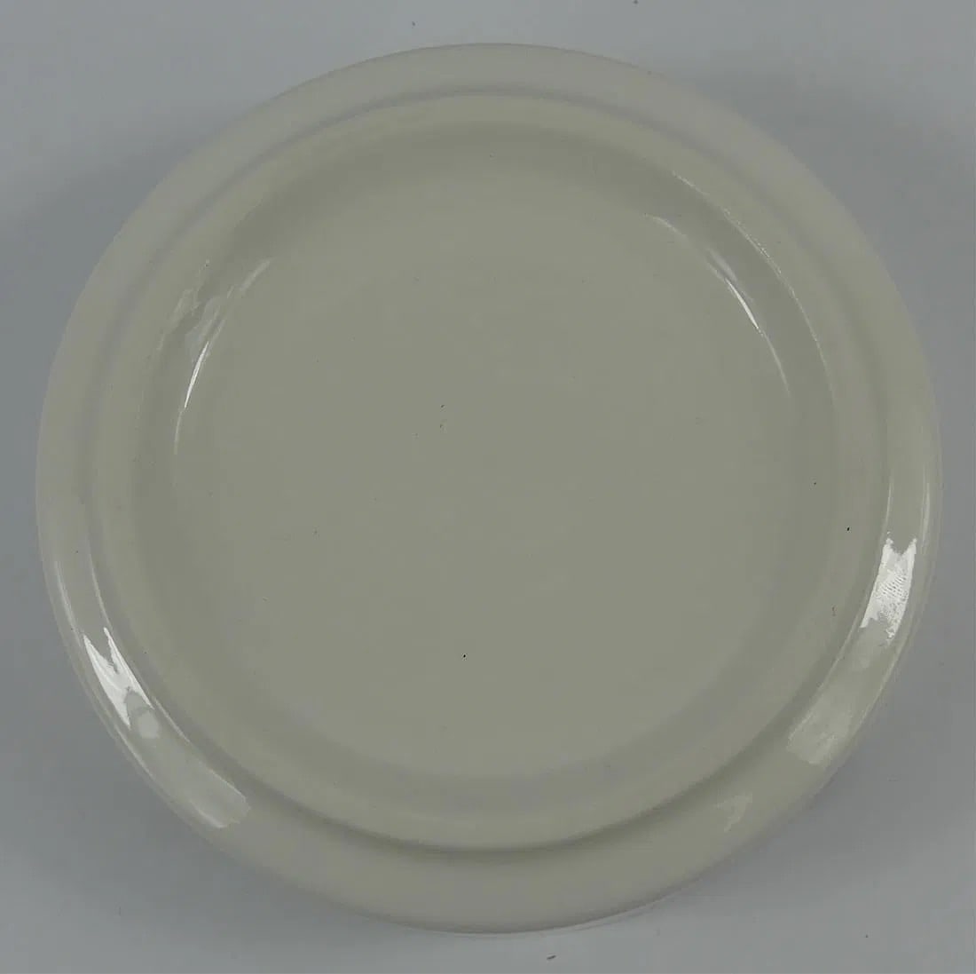 Yoshitomo Nara, Fuck the Rotten World ashtray: Fuck the Rotten World ashtray, measures 4 x 4 x 1/4 inches