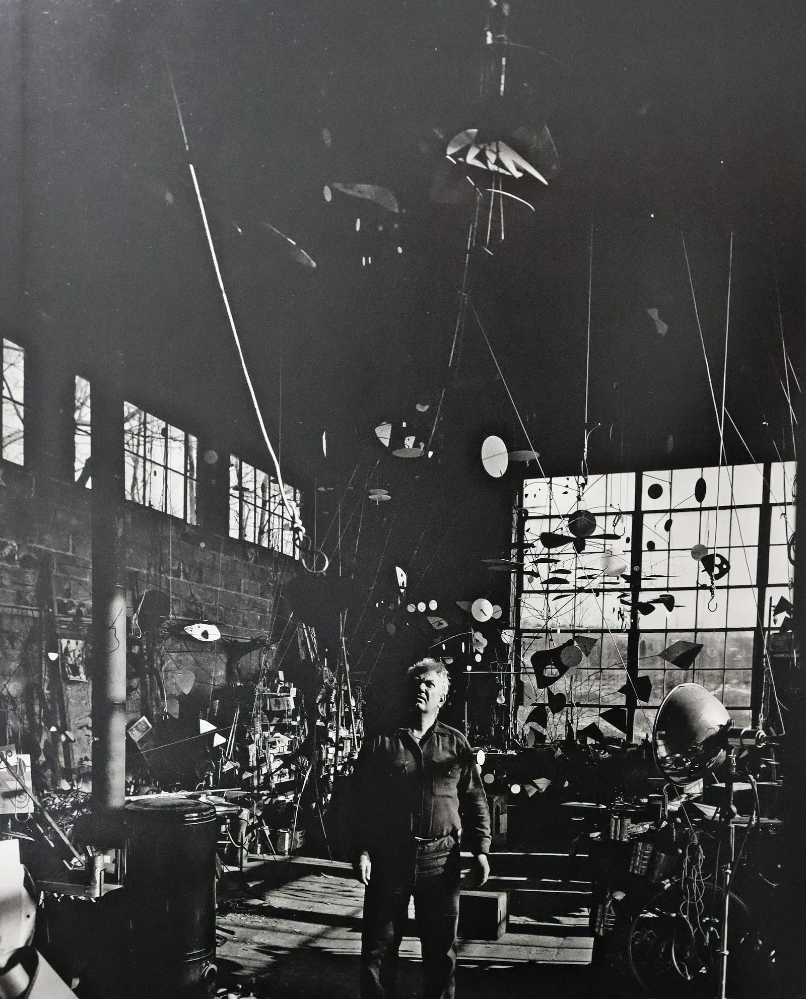Gordon Parks - Alexander Calder, Roxbury, Photo-Litho: GORDON PARKS - (1912-2006), Alexander Calder in His Workshop, Roxbury,, Connecticut, Photo-Litho, Printed later 20th Century, 9" x 7" (Image Size), Mounted to archival board