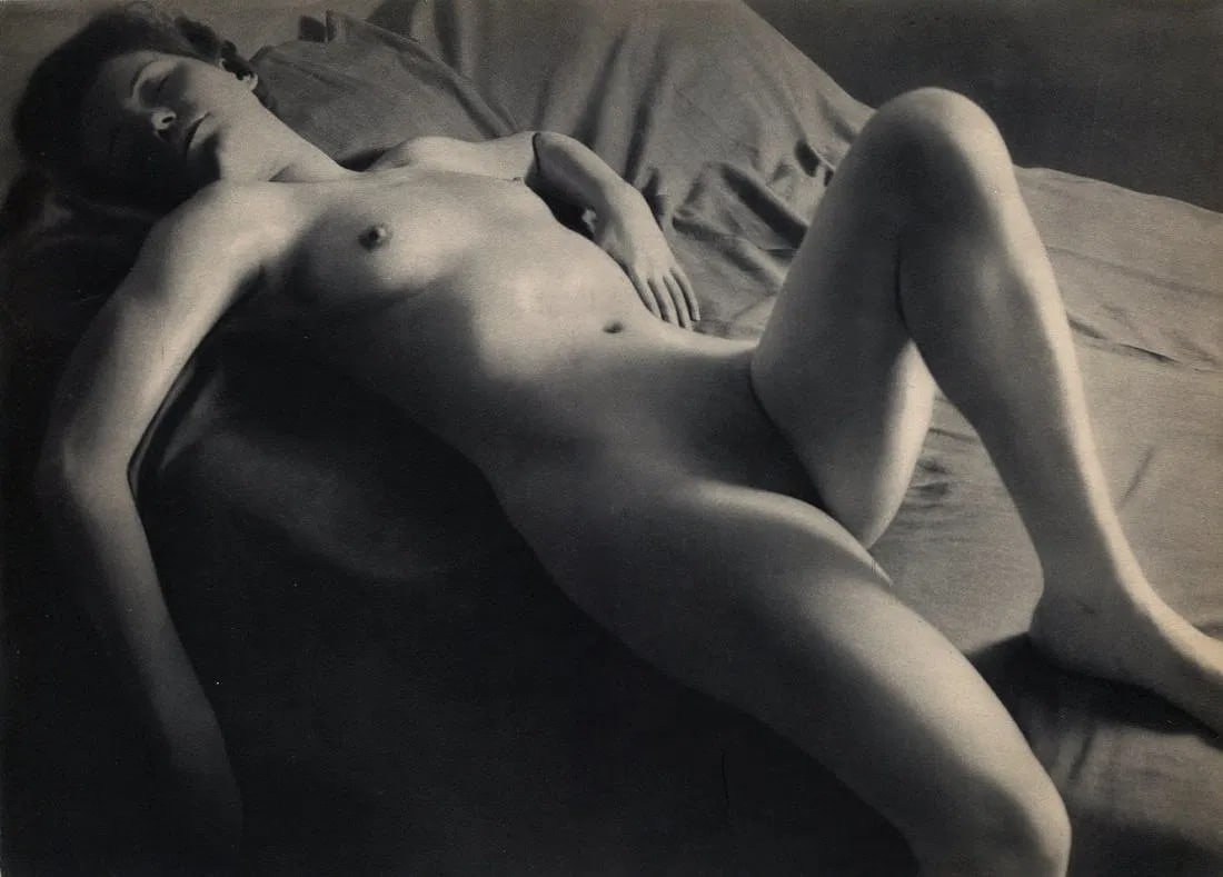 Brassai - (Nude) Woman Nude Reclining: Vintage Sheet-fed Gravure printed in the 1950s/60s. A classic Parisian study of the female form. Image size: 9" x 11.5"., Mounted to archival board