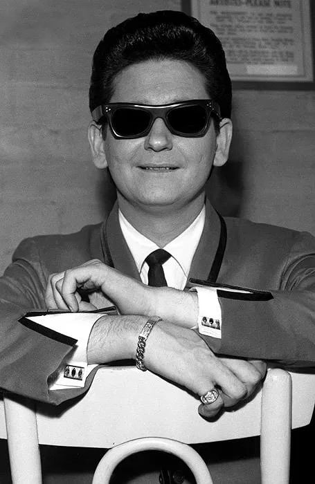 Berriff, Paul - Roy Orbison: High-quality modern print. A rare, candid 1960s backstage portrait of the legendary singer. Image size: approx. 12" x 15"., Mounted to archival board