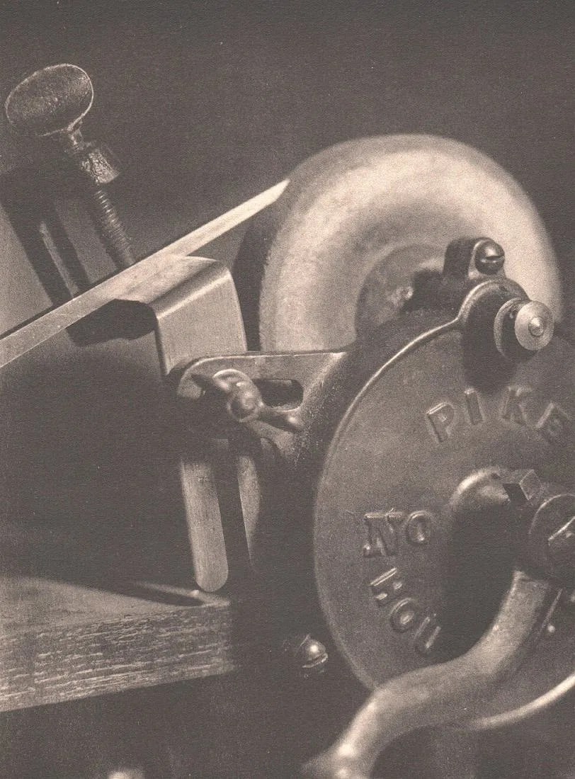 Case, Charles W - The Grindstone: Vintage Collotype printed in 1929 by Meriden Gravure. An exceptional textural study. Image size: approx. 7.5" x 9.5"., Mounted to archival board