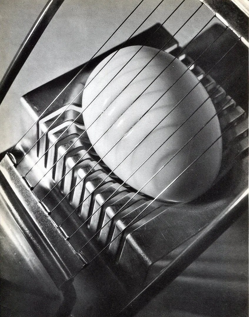 Quigley, Edward - "Egg Slicer": Vintage Sheet-fed Gravure. A classic modernist/precisionist study of an everyday object. Image size: approx. 7.5" x 9.5"., Mounted to archival board