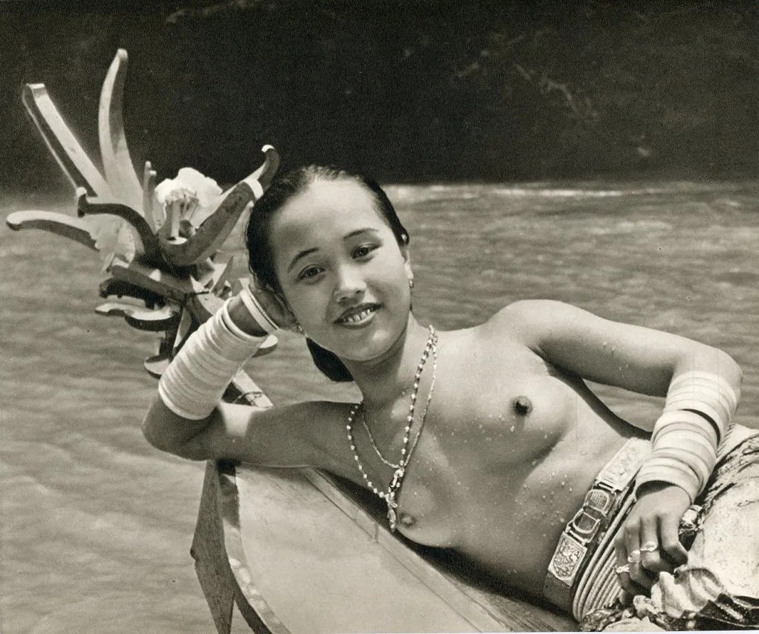 Wong, KF - Dyak Woman From Sarawak: Vintage Sheet-fed Gravure. An ethnographic portrait from the renowned Sarawak photographer. Image size: approx. 8.5" x 11"., Mounted to archival board