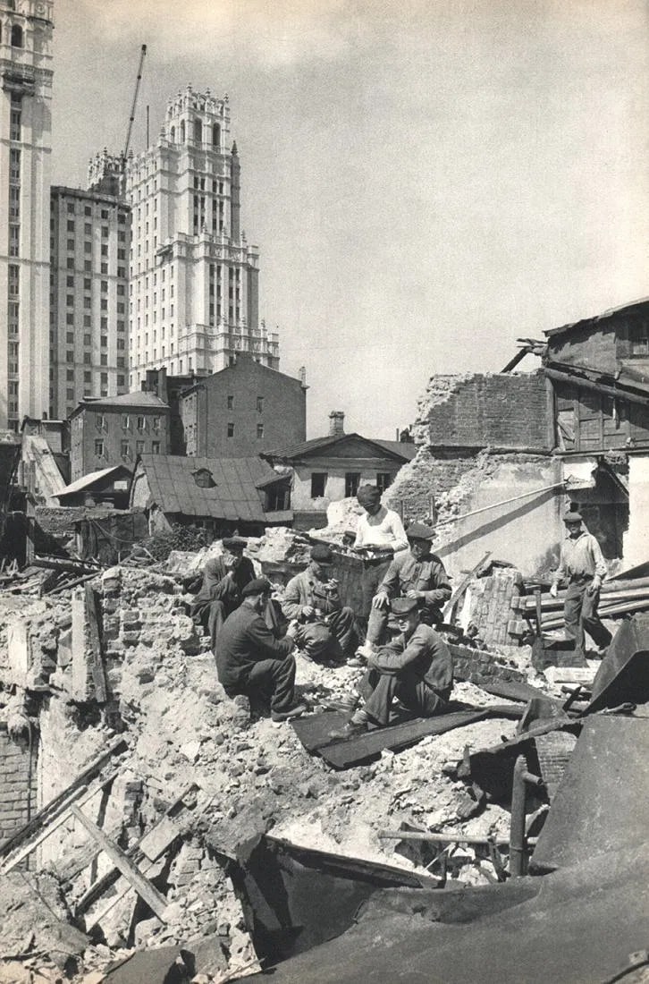 Cartier-Bresson - Tearing Down Houses, Moscow: Vintage Sheet-fed Gravure printed in 1955. Documentation of urban change in the Soviet Union. Image size: approx. 9" x 13.5"., Mounted to archival board